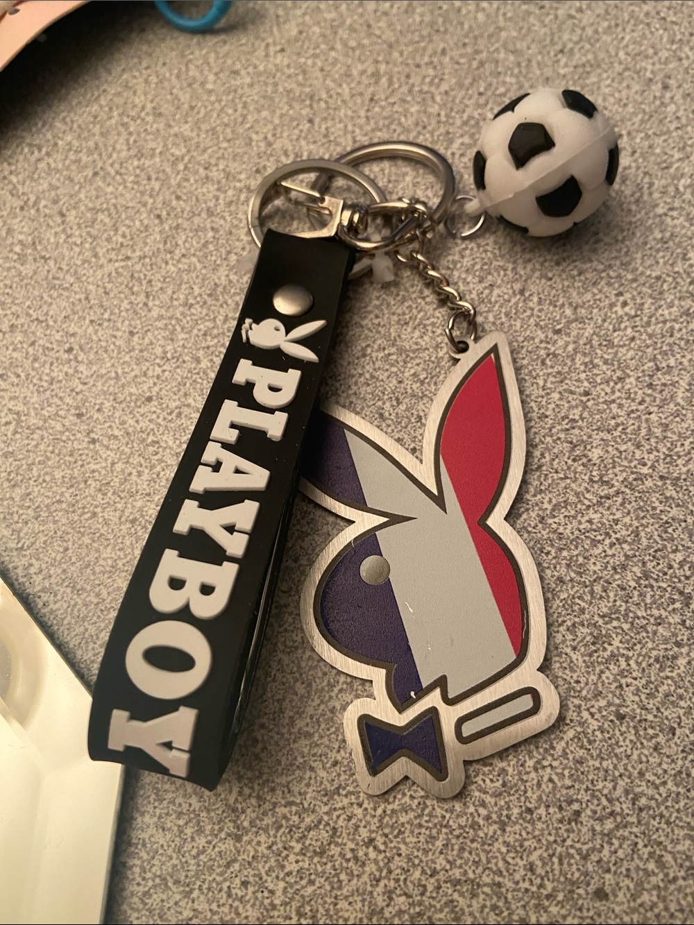 PLAYBOY Black Keychain with Red, White & Blue Bunny Charm and Soccer Ball